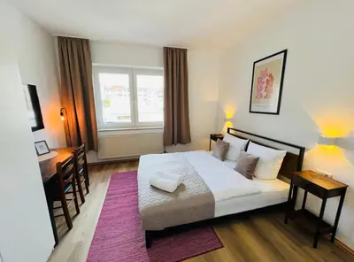 Ein Bett oder Betten in einem Zimmer der Unterkunft Apartment Duisburg Hbf Zentrum Business Messe Düsseldorf