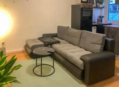 Ein Sitzbereich in der Unterkunft Grüne Oase mit Balkon I EG