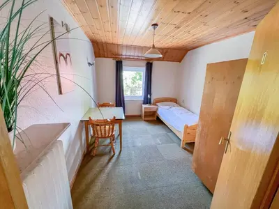 Ein Bett oder Betten in einem Zimmer der Unterkunft Hotel Bollerott