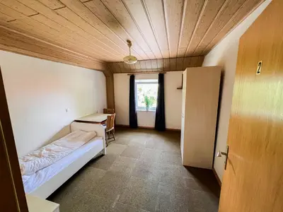 Ein Bett oder Betten in einem Zimmer der Unterkunft Hotel Bollerott