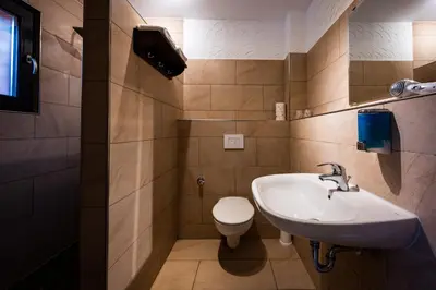 Ein Badezimmer in der Unterkunft Roadcamp - American Motel & Sportsbar