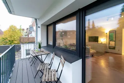 Ein Balkon oder eine Terrasse in der Unterkunft Cozy apartment with kitchen + balcony NEW!