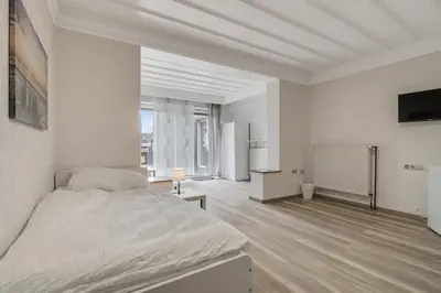 Ein Bett oder Betten in einem Zimmer der Unterkunft Unterkunft mit Balkon in Lünen