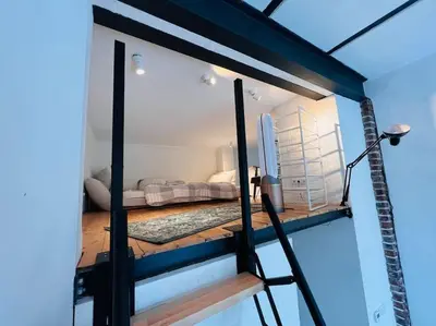 Ein Bett oder Betten in einem Zimmer der Unterkunft Luxus Loft im Herzen von Bochum Werne.