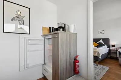 Ein Bett oder Betten in einem Zimmer der Unterkunft cruwzo I Cozy apartment next to university hospital Essen