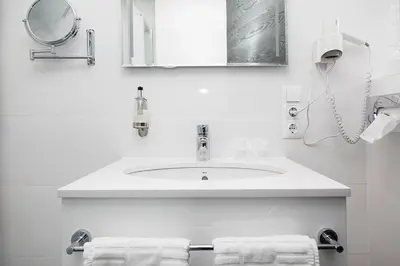 Ein Badezimmer in der Unterkunft Hotel Engelbert