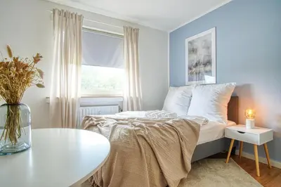 Ein Bett oder Betten in einem Zimmer der Unterkunft HOMEFY - Studio Stella