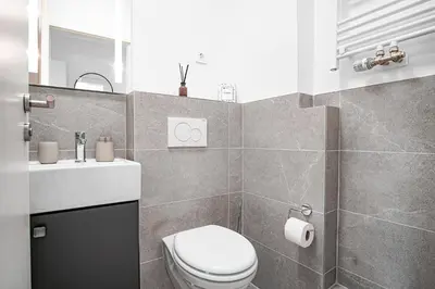 Ein Badezimmer in der Unterkunft HOMEFY - Feel Good Apartment