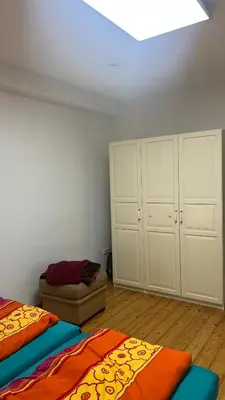 Ein Bett oder Betten in einem Zimmer der Unterkunft Erdgeschoss Apartment am Park im Theaterviertel in Oberhausen