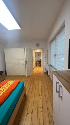 Ein Bett oder Betten in einem Zimmer der Unterkunft Erdgeschoss Apartment am Park im Theaterviertel in Oberhausen