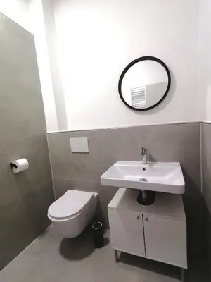 Ein Badezimmer in der Unterkunft estrella24 LIVING ROOMS Singapur