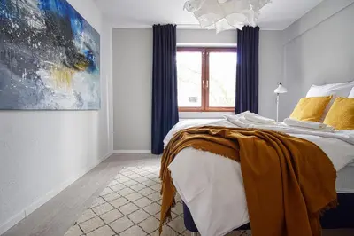 Ein Bett oder Betten in einem Zimmer der Unterkunft HOMEFY - Family Apartment