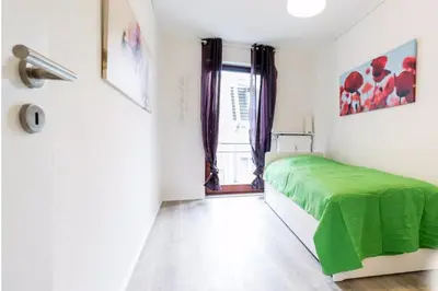 Ein Bett oder Betten in einem Zimmer der Unterkunft HOMEFY OLDTOWN APARTMENT - 6 people - 2 bath - balcony - top location