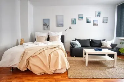 Ein Bett oder Betten in einem Zimmer der Unterkunft HOMEFY - Sleep & Relax Apartment