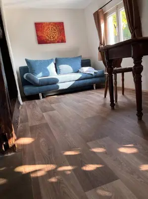 Ein Sitzbereich in der Unterkunft Wohnen auf dem Bauernhof