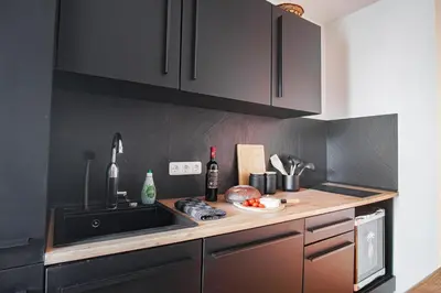 Küche/Küchenzeile in der Unterkunft Apartment I Wi-Fi I Parkplatz I Balkon EssenFusion
