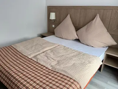 Ein Bett oder Betten in einem Zimmer der Unterkunft Brauhaus Hotel Ruetershoff