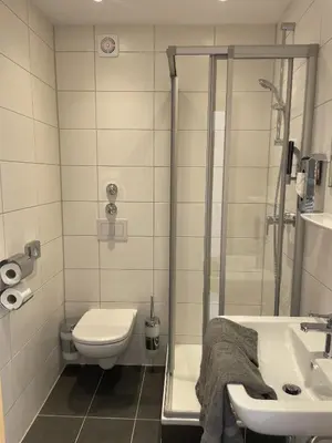 Ein Badezimmer in der Unterkunft Brauhaus Hotel Ruetershoff