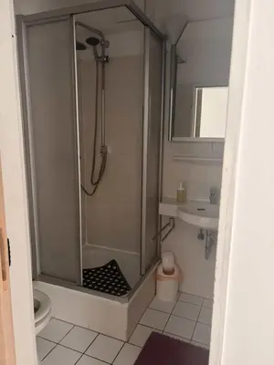 Ein Badezimmer in der Unterkunft Hotel Gästehaus Altena