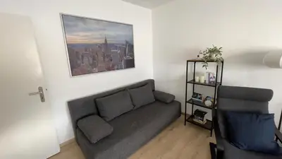 Ein Sitzbereich in der Unterkunft Apart54-Modern Design I Garden with Terrace I Smart TV I Free Parking I Free WiFi