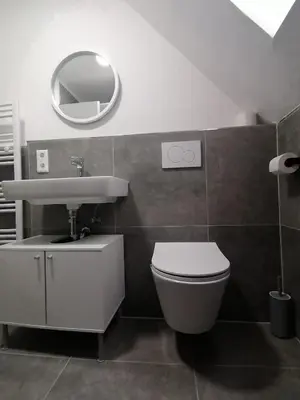 Ein Badezimmer in der Unterkunft estrella24 LIVING ROOMS Chita