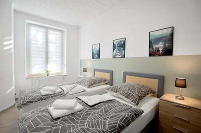 Ein Bett oder Betten in einem Zimmer der Unterkunft Rudi Homes Essen #1