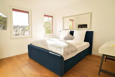 Ein Bett oder Betten in einem Zimmer der Unterkunft Victoria Altstadt Boardinghouse