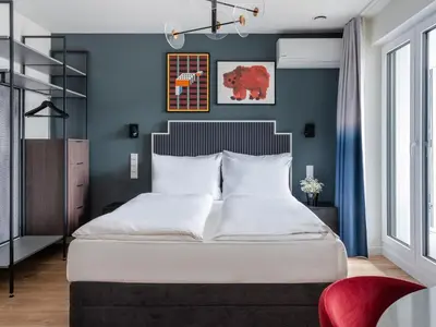 Ein Bett oder Betten in einem Zimmer der Unterkunft Numa Düsseldorf Leo
