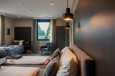 Ein Bett oder Betten in einem Zimmer der Unterkunft Liro Hotel Oberhausen