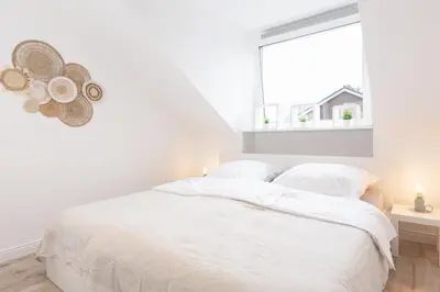 Ein Bett oder Betten in einem Zimmer der Unterkunft Mc‘Maggies Atelier