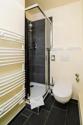 Ein Badezimmer in der Unterkunft Reinoldus Hotel Dortmund