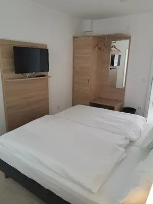 Ein Bett oder Betten in einem Zimmer der Unterkunft Becky´s Kolpinghaus