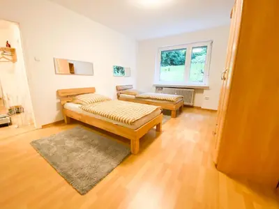 Ein Bett oder Betten in einem Zimmer der Unterkunft 1-5 Pers. 0,9 km zum Zentrum Remscheid, schön Wohnen, 105 qm