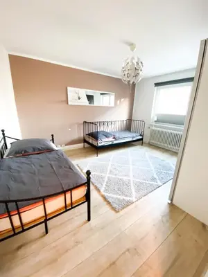 Ein Bett oder Betten in einem Zimmer der Unterkunft 1-3 Pers. zentral gelegene, gemütliche Wohnung in Remscheid