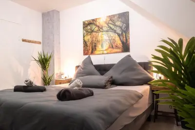 Ein Bett oder Betten in einem Zimmer der Unterkunft Apartment Matterhorn Gemütliche Wohnung mitten im Ruhrpott