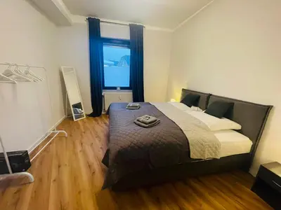 Ein Bett oder Betten in einem Zimmer der Unterkunft modern * gemütlich * Nespresso * Terrasse * Netflix
