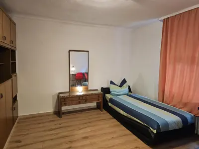 Ein Bett oder Betten in einem Zimmer der Unterkunft Knusperhäuschen