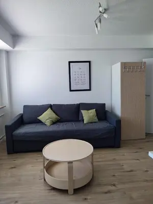 Ein Sitzbereich in der Unterkunft Moderne Ferienwohnung Messe Monteurwohnung Business Appartement Ratingen 4-5 P, Flughafen Düsseldorf