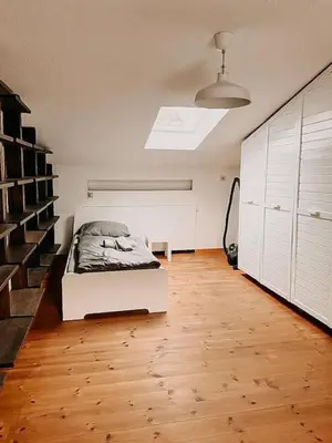 Ein Bett oder Betten in einem Zimmer der Unterkunft Wohnen im ruhigen Mülheim an der Ruhr. UDG