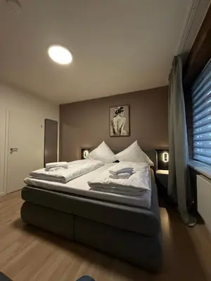 Ein Bett oder Betten in einem Zimmer der Unterkunft Shin Central