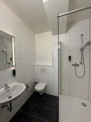 Ein Badezimmer in der Unterkunft Shin Central