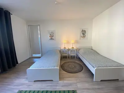 Ein Bett oder Betten in einem Zimmer der Unterkunft Nice Apartment in Essen