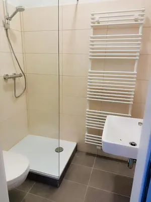 Ein Badezimmer in der Unterkunft Wohngut-City Apt. 1 Zi. 1 DB + 1 EZ 34 qm mit Parkplatz