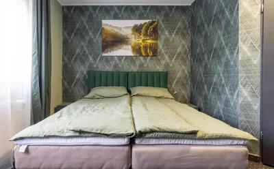 Ein Bett oder Betten in einem Zimmer der Unterkunft Bed and Breakfast 33