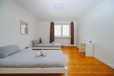Ein Bett oder Betten in einem Zimmer der Unterkunft City Wohnung Zentral 89-11