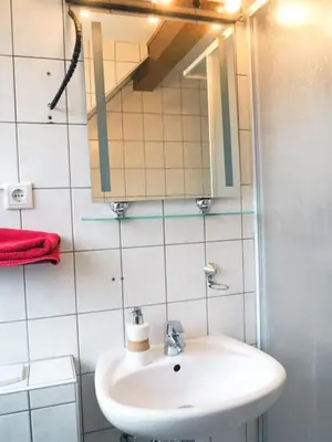 Ein Badezimmer in der Unterkunft City Wohnung Zentral 89-12