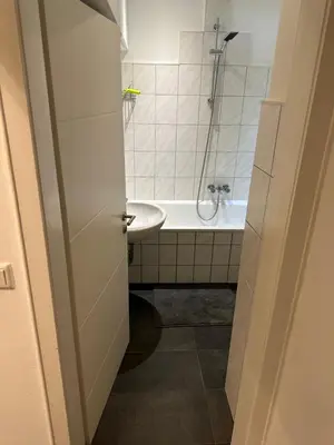 Ein Badezimmer in der Unterkunft Butler Suites