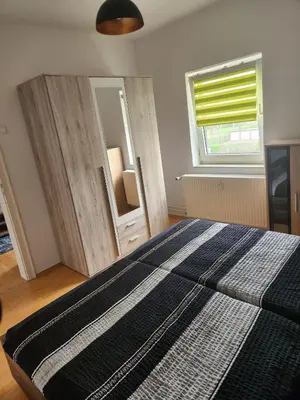 Ein Bett oder Betten in einem Zimmer der Unterkunft Wohnung HAMMer