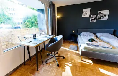 Ein Bett oder Betten in einem Zimmer der Unterkunft Modernes Apartment l Oasis l mit Balkon Nähe Hauptbahnhof