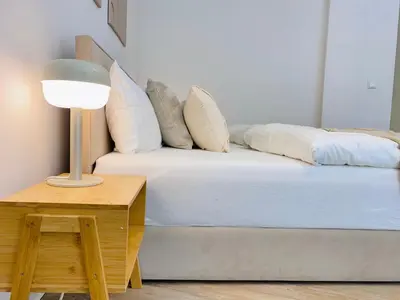 Ein Bett oder Betten in einem Zimmer der Unterkunft Bunker Studio Zentral Messe Business Streaming